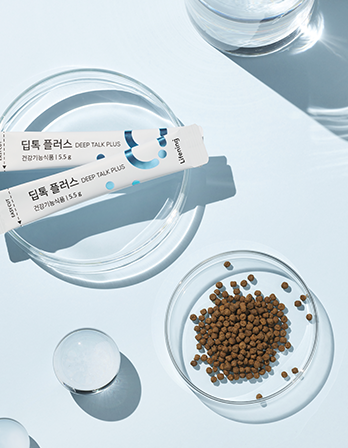 Supplement capsules in a petri dish with a tube labeled 'DEEP TALK PLUS' on a light blue background.